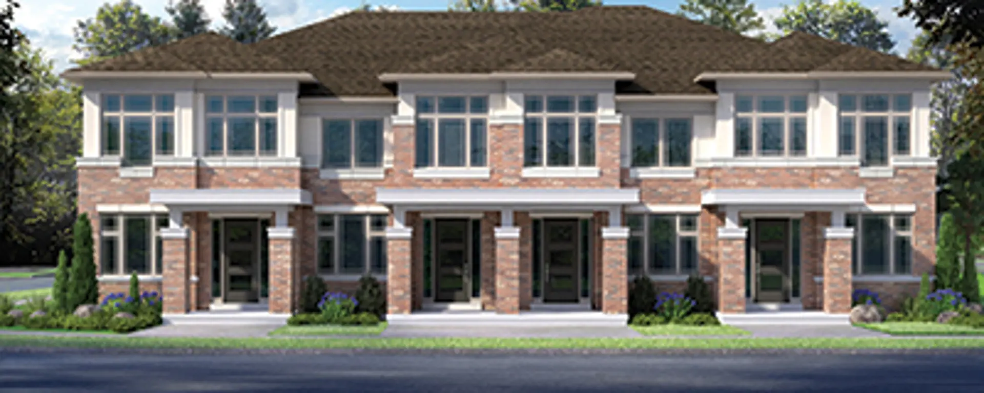 Townhome project by Towerhill Homes in Pickering, featuring a modern multi-unit residential development with large windows and brick exteriors